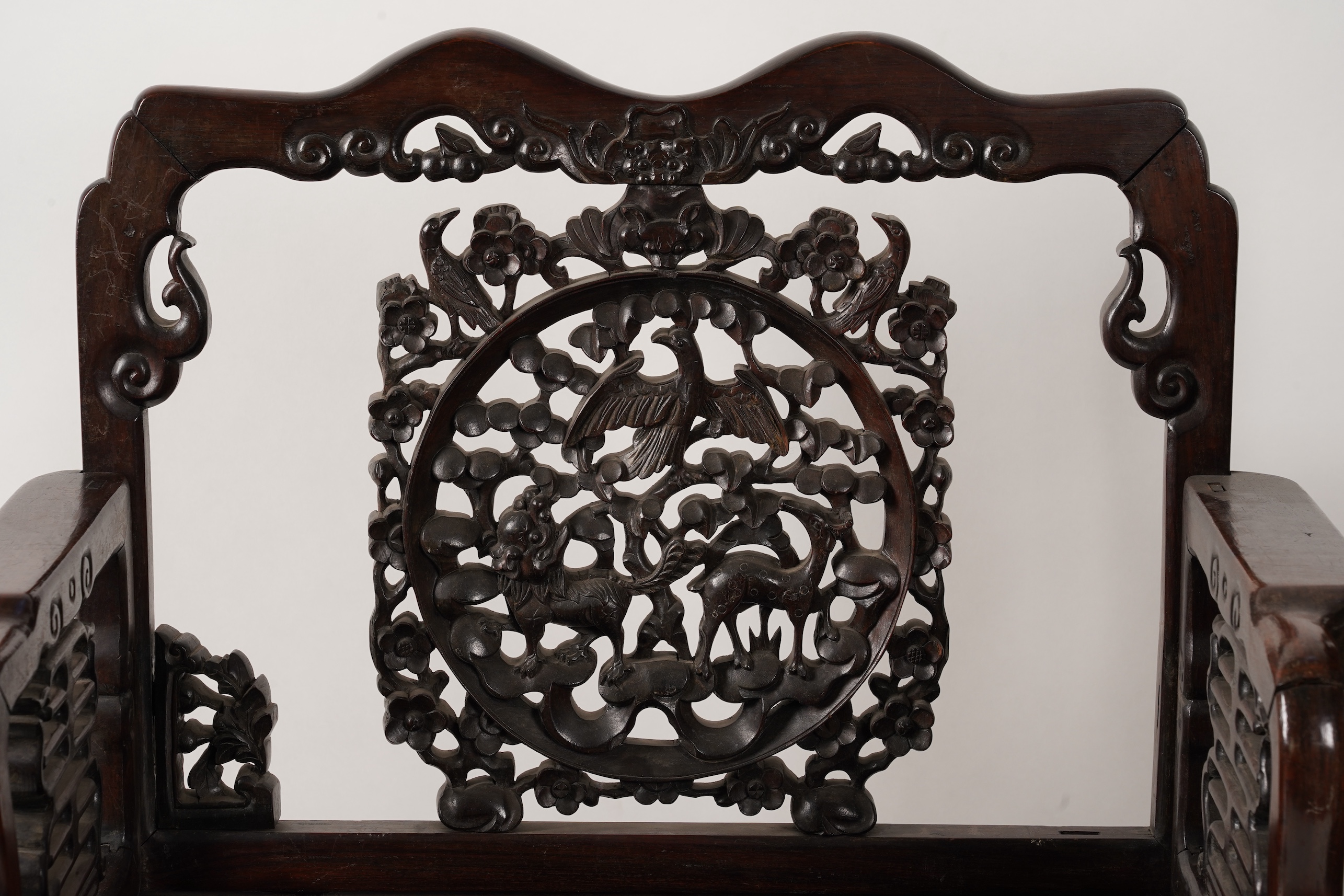 A pair of Chinese hongmu armchairs, late 19th century